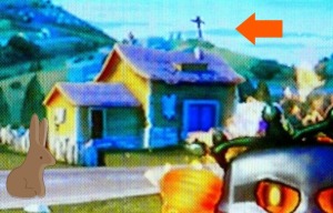 The arrow points to a cross in the background (no, it's not the house antenna).  I inserted the chocolate bunny  as sort-of my own Easter time "easter egg."